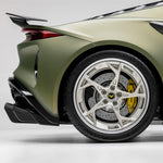 Emira rear wing side profile with rear wheel, close-up