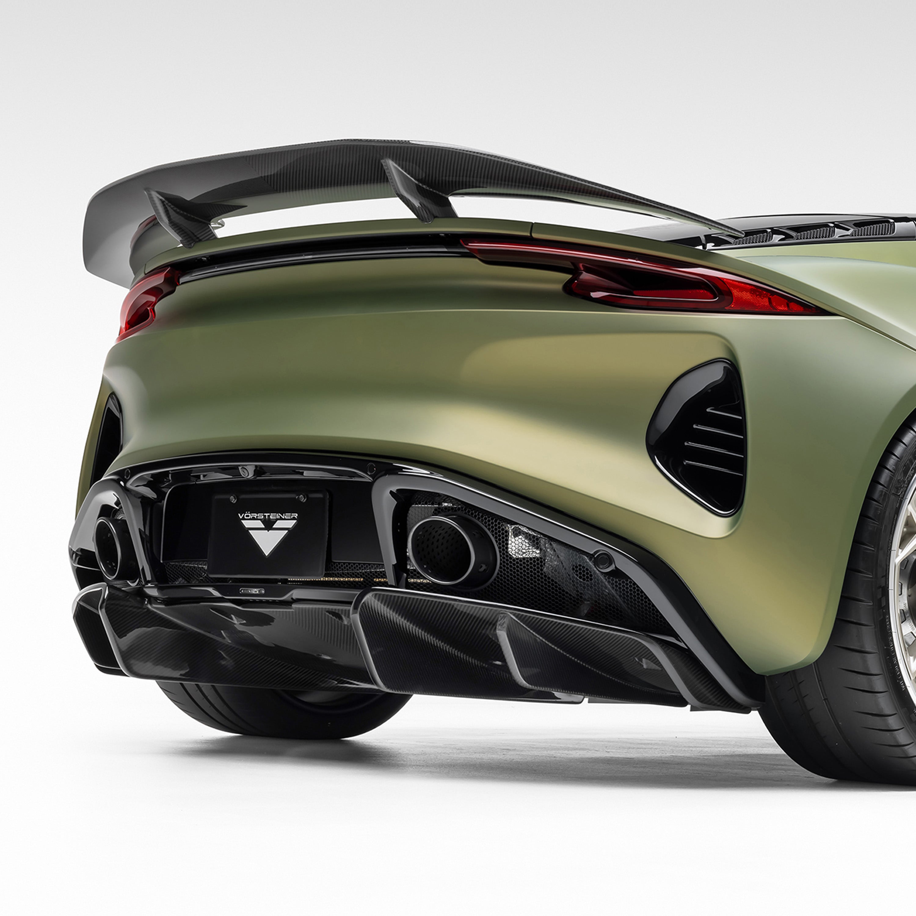 Emira wing and rear diffuser, low rear 3/4 view