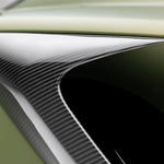 2x2 carbon weave inside Emira side intake, macro