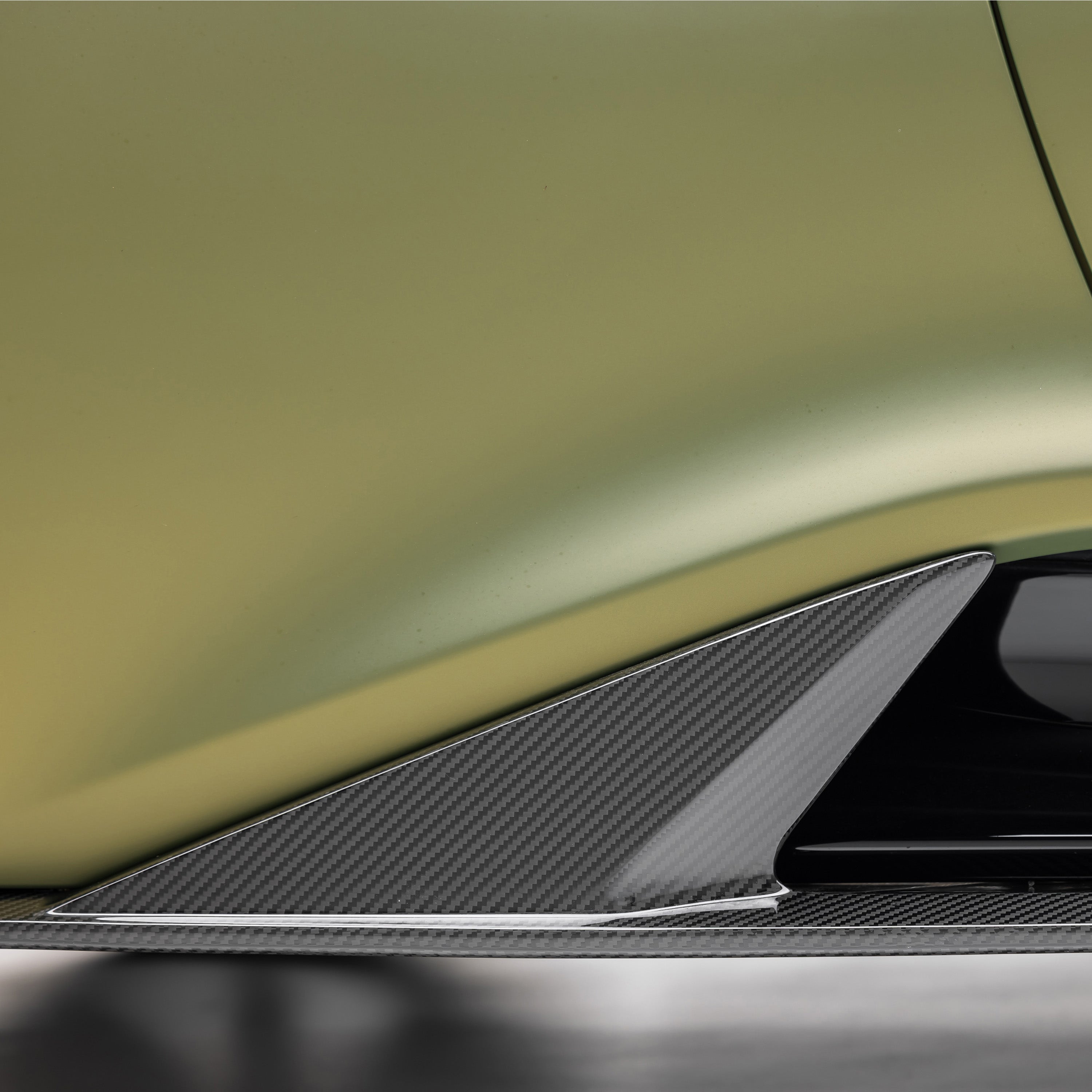 LR-52 side skirt end on Emira, low angled view