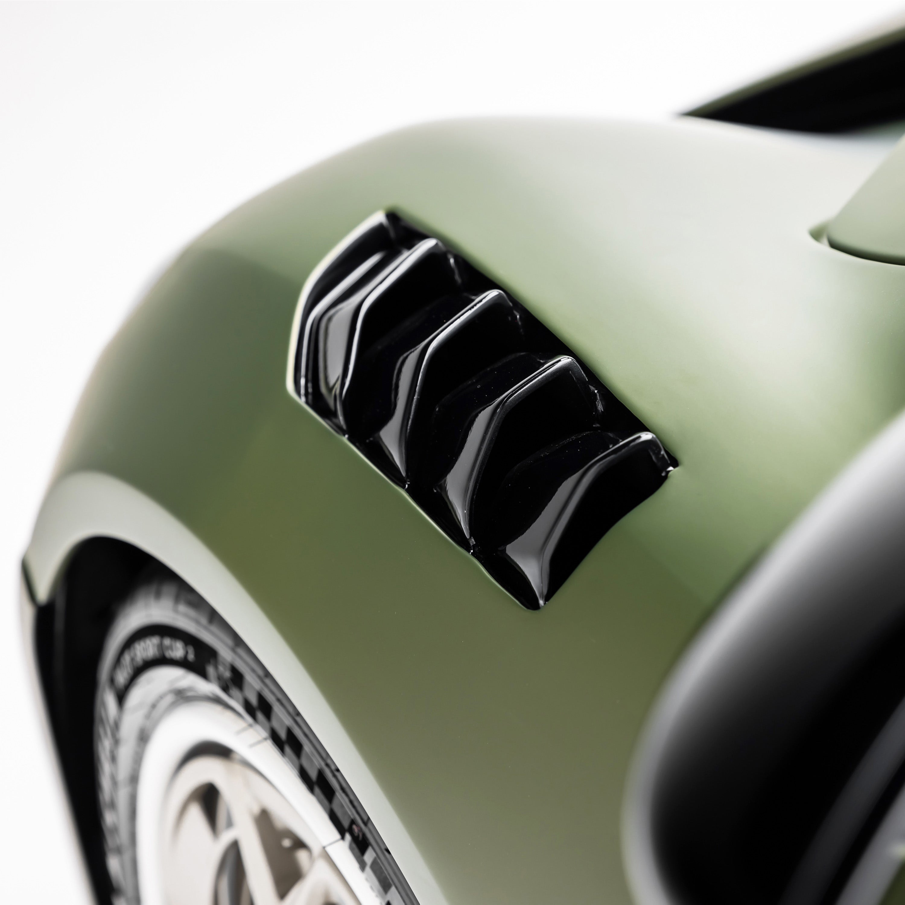 Carbon fender louvers on Lotus Emira, high angled close-up