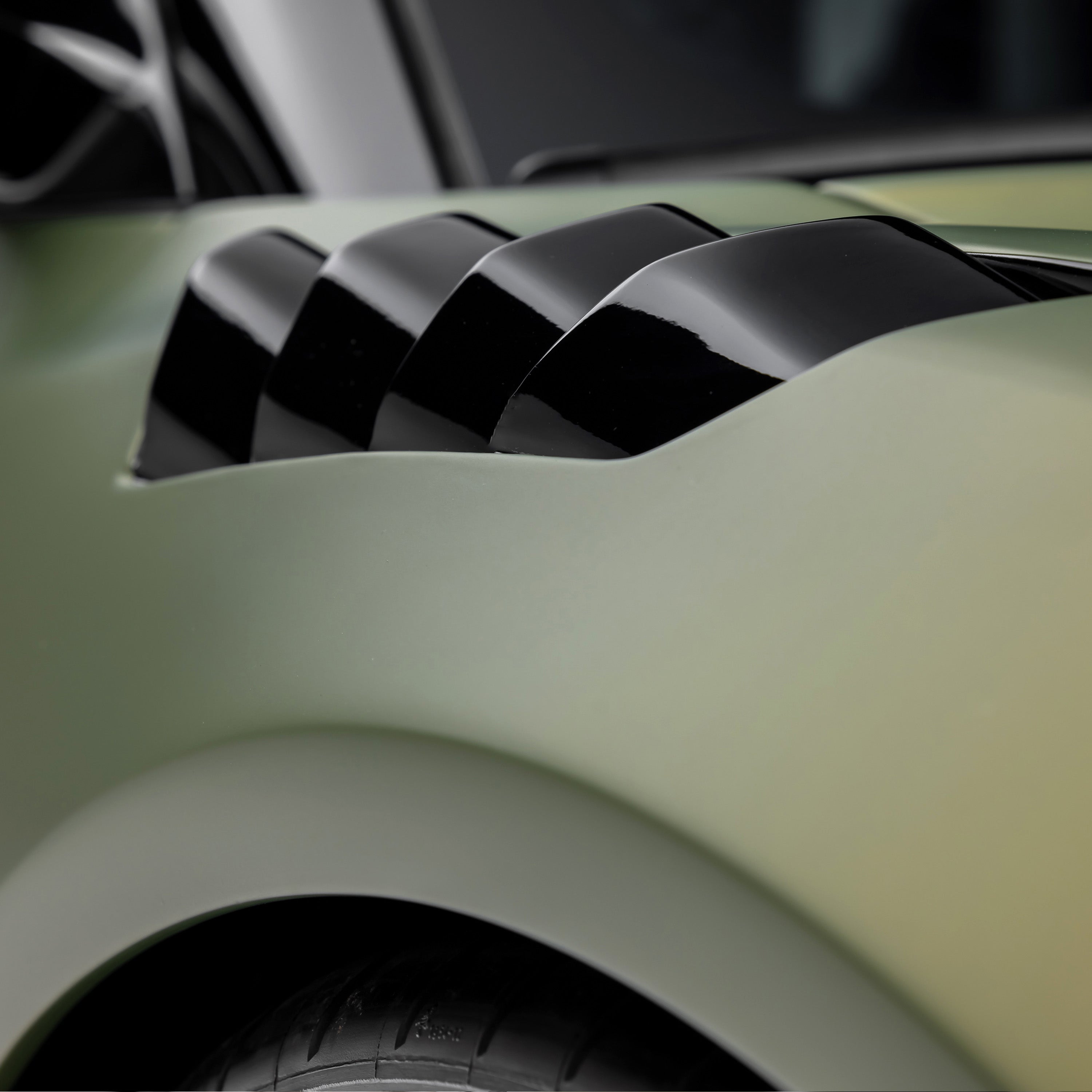 Emira vented fender louvers from above, detail