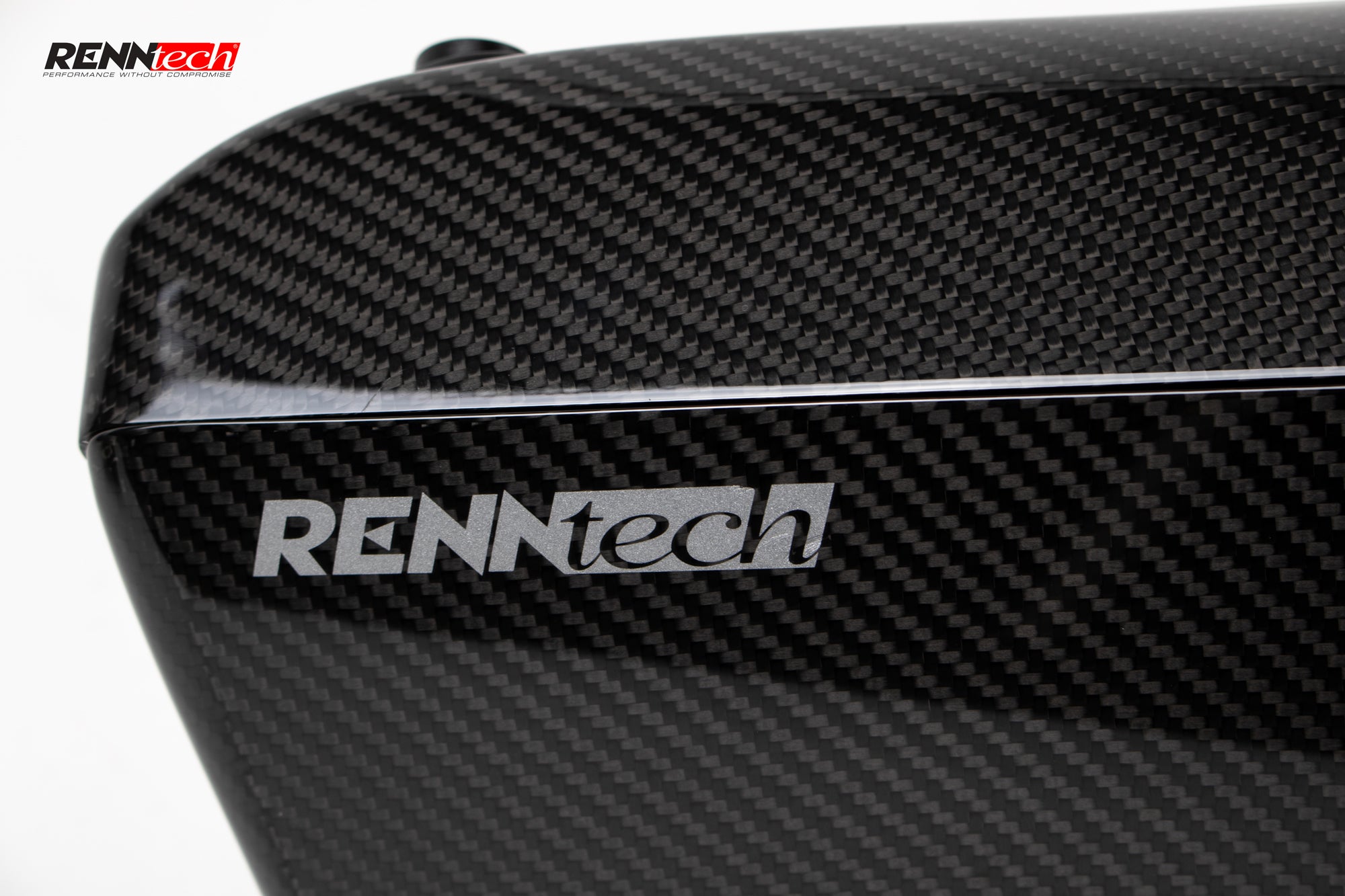 Close-up of the gloss carbon airbox lid with the RennTech logo - Carbon Fiber Airbox for the 2021-2026 GLE 63 / GLS 63 AMG