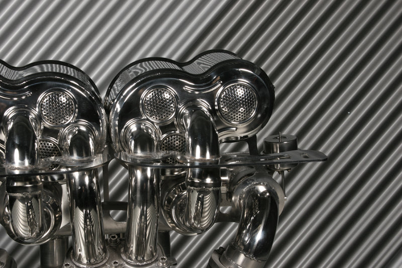 Close-up of polished collectors on Capristo Lamborghini Murcielago valved exhaust