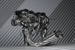 Side view of Capristo Murcielago valved exhaust with twin round outlets