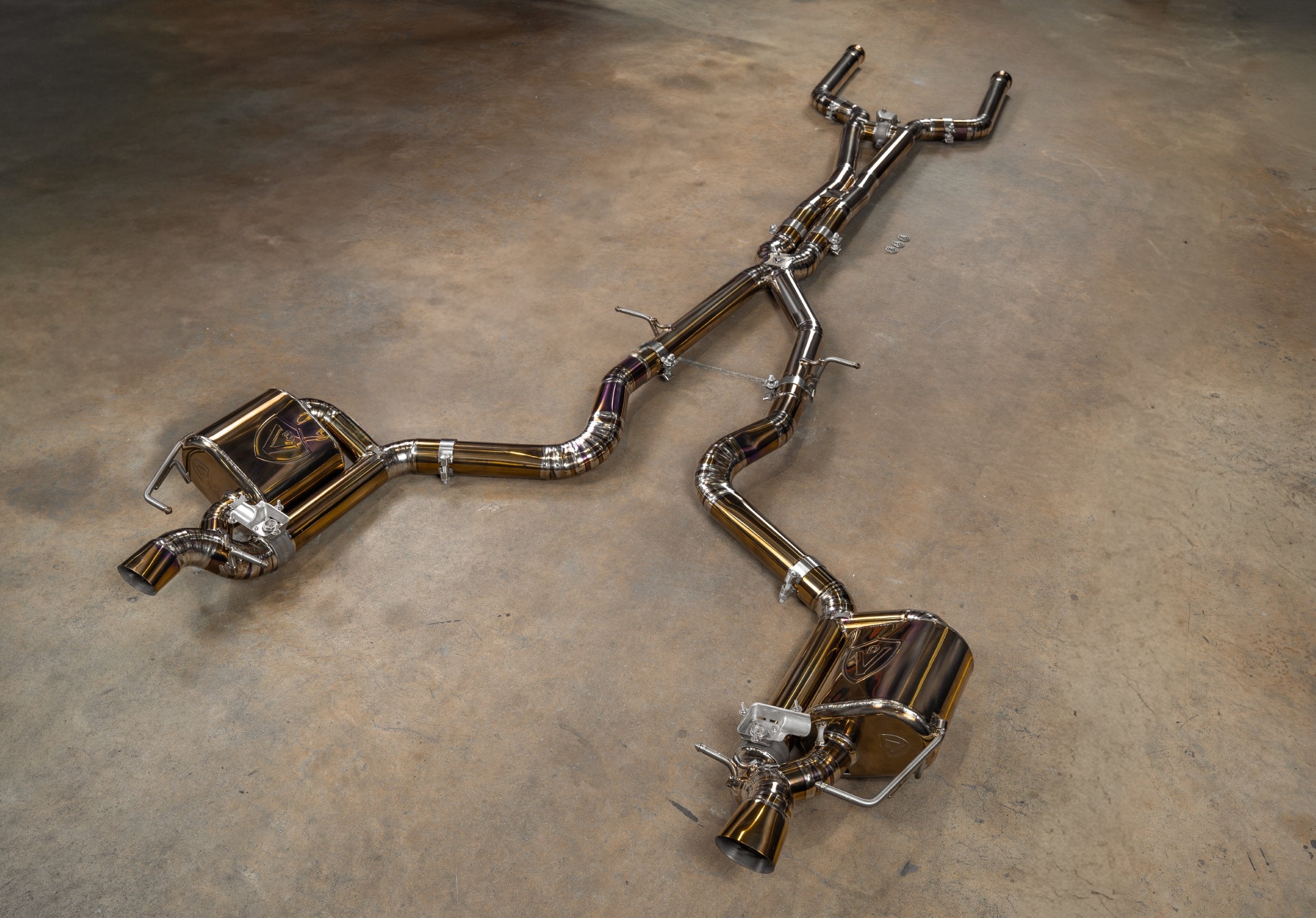Valvetronic Designs Valved Exhaust AMG GT63 X290 manufacturer gallery: complete exhaust laid diagonally across the floor