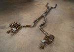 Valvetronic Designs Valved Exhaust AMG GT63 X290 manufacturer gallery: complete exhaust laid diagonally across the floor