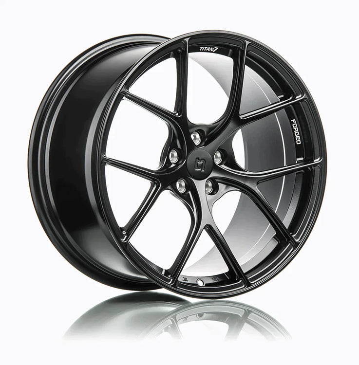 A side view of 7 T-S5 Forged Split 5 Spoke Exotic Wheels in Machine Black for PORSCHE 18" BOXSTER CAYMAN (987 981 718) 2005+
