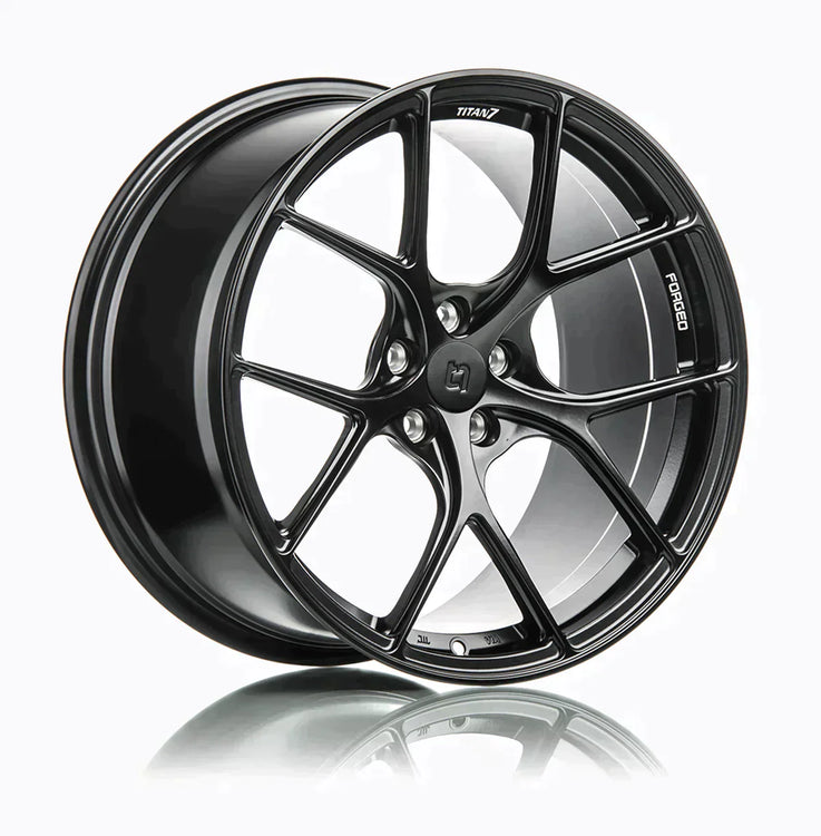 A side view of 7 T-S5 Forged Split 5 Spoke Exotic Wheels in Machine Black for VOLKSWAGEN 18" MK7 2014-2023
