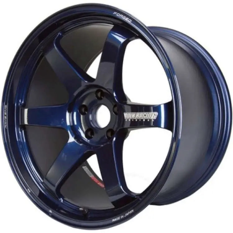 A front view of Volk Racing TE37 Ultra M-Spec Wheel 19x9.5 5x120 36mm Mag Blue with white background