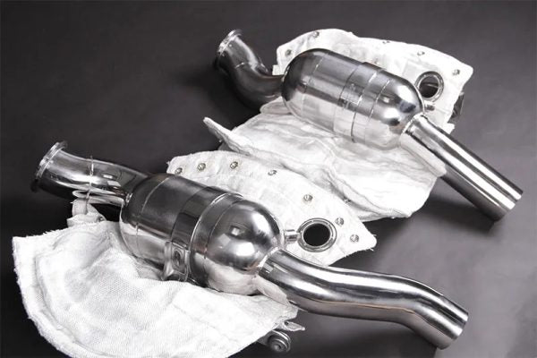 wide view of Capristo Cat Delete Pipes for Maserati Ghibli/Quattroporte Trofeo/Quattroporte GTS 2013+ with black background 