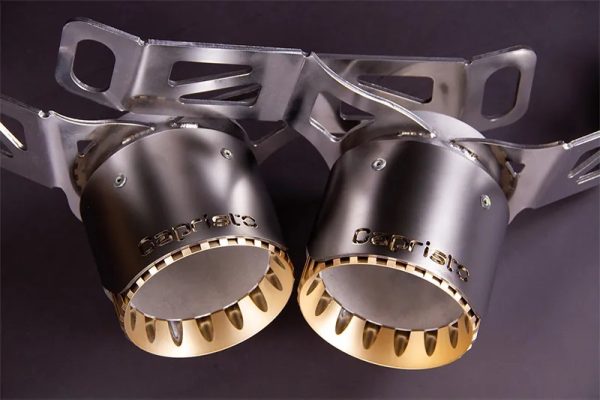 close front view of Capristo Exhaust System with Wicrom Black Chrome End Pipes for Maserati MC20 2020-2025 with black background