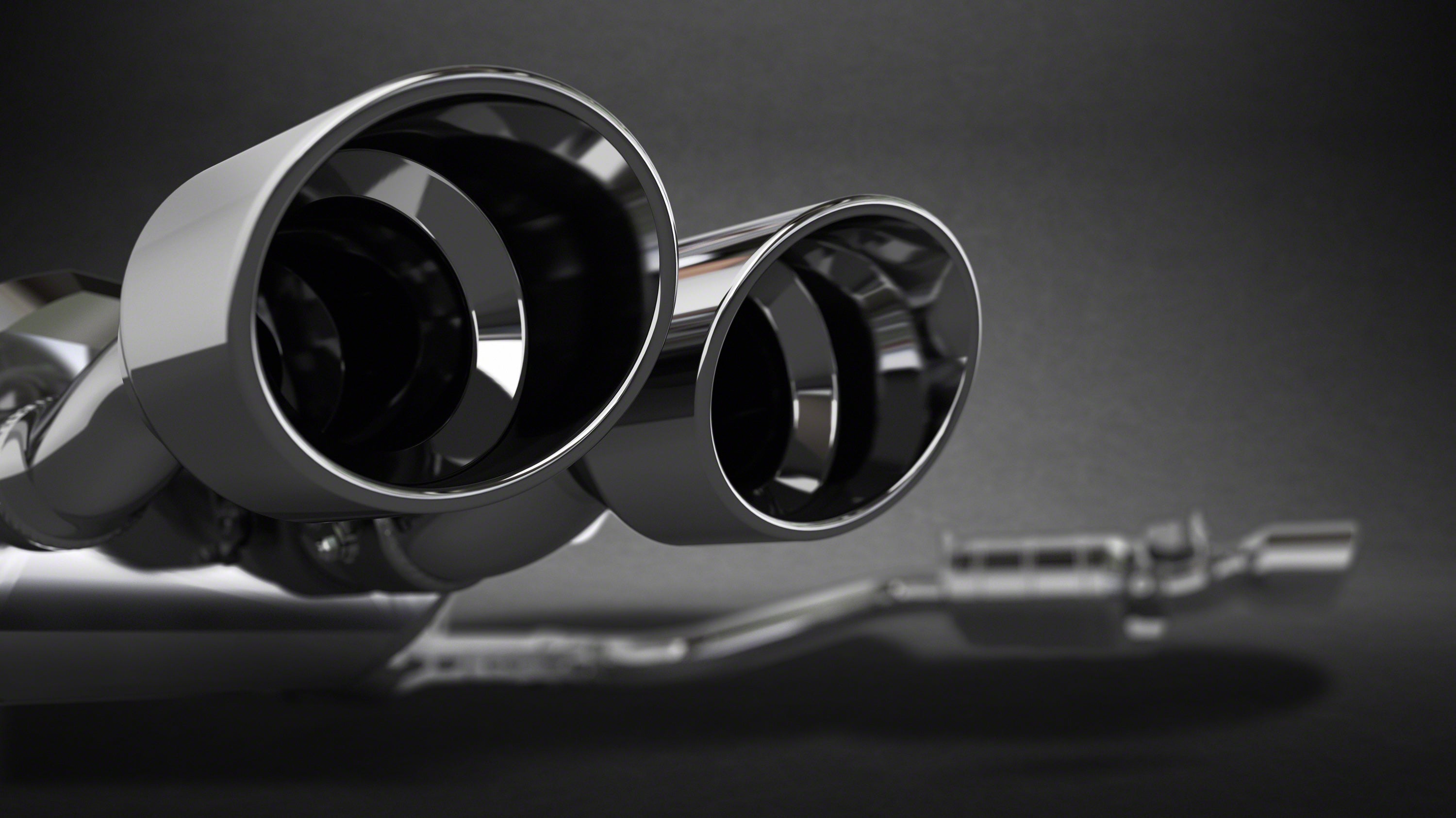 Close-up of polished double-wall round tips on Capristo Maserati Ghibli valved exhaust