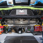 McLaren GT rear with the Fabspeed valved X-pipe installed in the shop