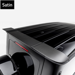 Satin carbon rear roof spoiler on black Mercedes G63, rear 3/4 view