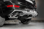Close-up of Capristo ceramic tips under rear bumper of Mercedes-AMG ML63 W164