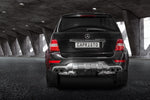 Black Mercedes-AMG ML63 W164 rear view with Capristo valved mufflers and ceramic tips