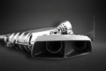 Close-up of black ceramic twin-outlet rectangular tip on Capristo ML63 W164 muffler