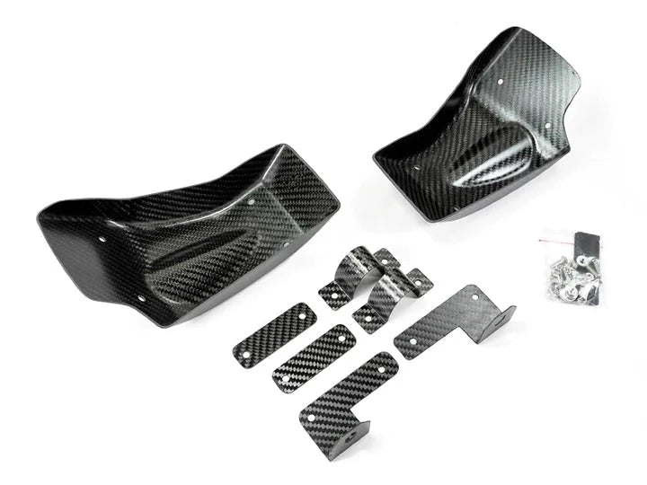 A front view of AUTOTECKNIC DRY CARBON FIBER BRAKE COOLING DUCT - NISSAN R35 GTR 2009+ with white background