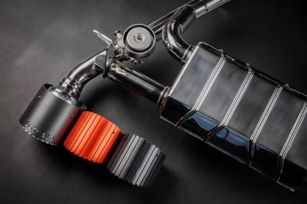 close top view of Capristo Valved Exhaust with Center Silencer Delete and Carbon/Wicrom Tips (CES3) for Nissan Z (RZ34) 2023-2025 with black background