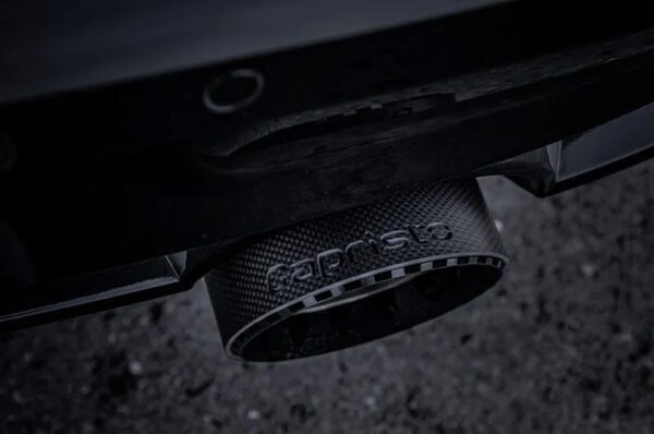 close top view of Capristo Valved Exhaust with Center Silencer Delete and Carbon/Wicrom Tips (CES3) for Nissan Z (RZ34) 2023-2025 fitted inside a car 