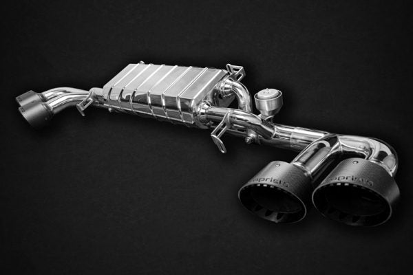 Close side view of Capristo Valved Exhaust with Mid-Pipes (Post Cat Spare) Carbon Tips (CES3) for Nissan GTR MK3/4/Nismo 2014+ with black background