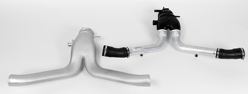 One-piece IPD cast Y-pipe beside the multi-piece factory 991 Turbo Y-pipe with rubber couplers - IPD for Porsche 991.1 Turbo