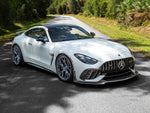 White C192 AMG GT on a country road with the RennTech carbon front splitter fitted
