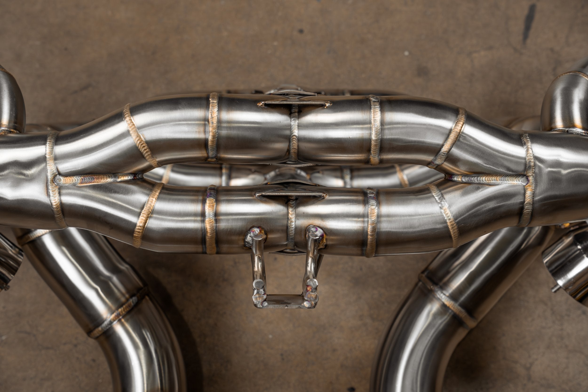 Stainless F1 exhaust Porsche Carrera GT: central welded junction