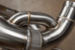 Stainless F1 exhaust Porsche Carrera GT: central logo bridge