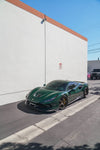 Green Ferrari F8 Tributo front three-quarter with carbon front aero lip