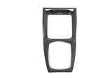 A front view of AUTOTECKNIC CARBON FIBER CENTER CONSOLE - BMW F97 X3M | F98 X4M LCI 2021+ with white background