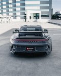 Grey Porsche 911 GT3 (992) rear view showing the lower rear diffuser