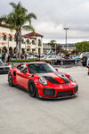 Red Porsche 911 GT2 RS front three-quarter with carbon front lip