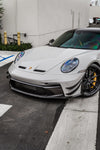 White Porsche 911 GT3 (992) front three-quarter with the 1016 vented hood