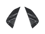 A front view of AUTOTECKNIC DRY CARBON FIBER SIDE MARKER SET - BMW G82/ G83 M4 2021+ with white background