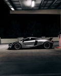 Silver McLaren 720S side profile with the Vision package in a parking garage