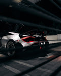 Silver McLaren 720S rear three-quarter with the Vision package at night