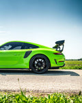 Green Porsche 911 GT3 RS (991.2) side profile with the complete aero kit