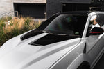Carbon vented hood on a white Lamborghini Urus, close-up