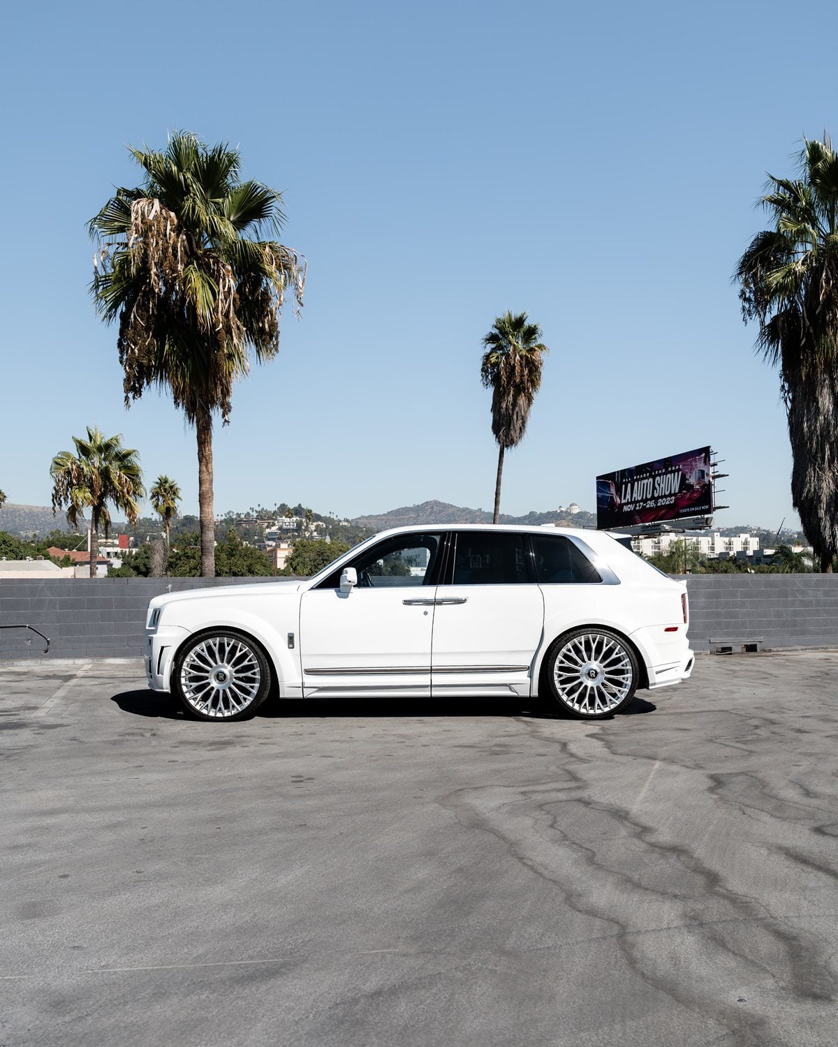 White Rolls-Royce Cullinan with the 1016 body kit, side profile