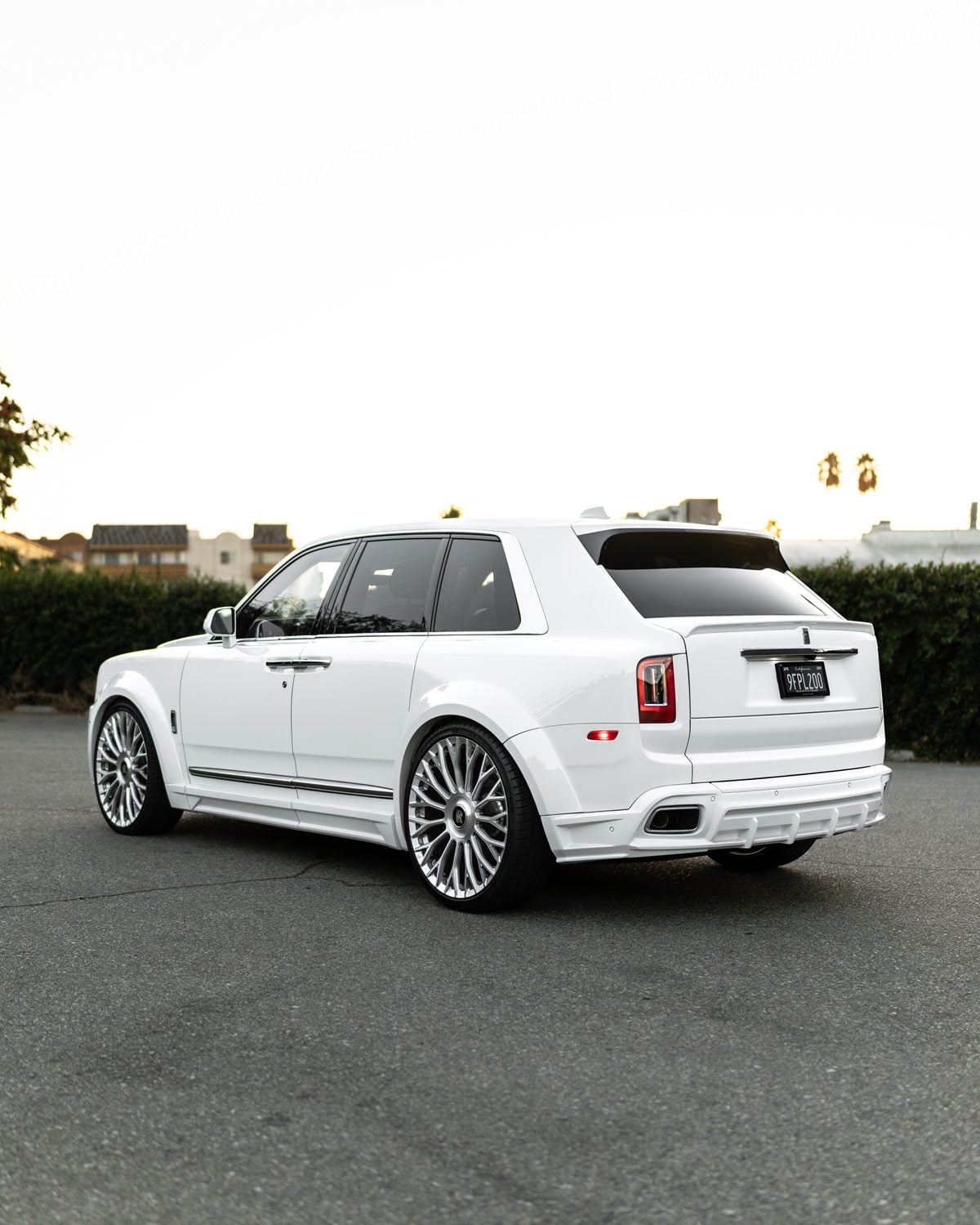 White Rolls-Royce Cullinan with the 1016 body kit, rear three-quarter