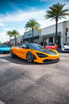 Orange McLaren 720S front three-quarter with the V1 complete aero kit