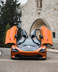Orange McLaren 720S front view with the V1 complete aero kit and doors up