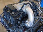 IPD direct-injection plenum and throttle body elbow test-fitted on a Porsche flat-six engine - IPD for Porsche 987.2 Boxster