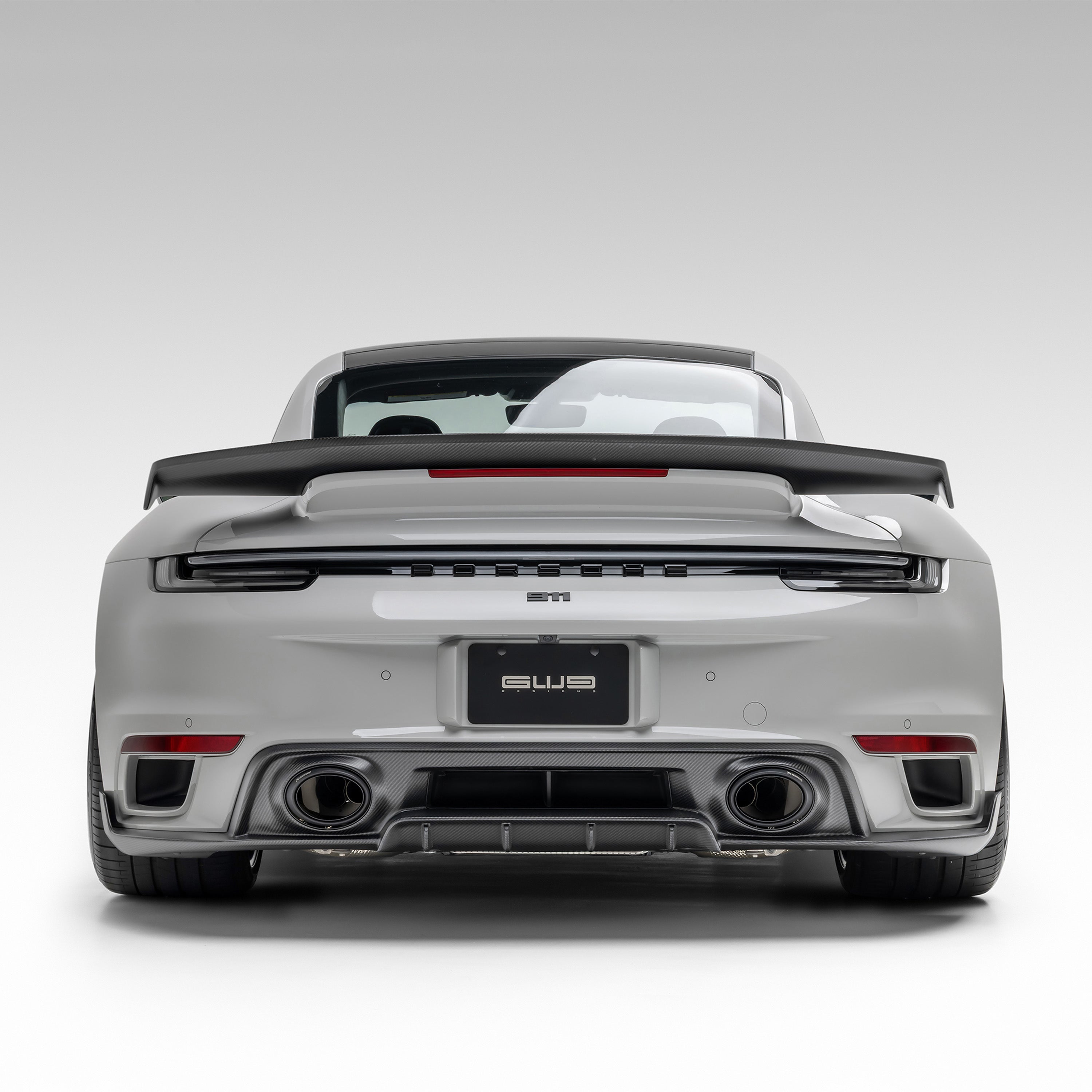 Porsche 992 Turbo S with Vorsteiner diffuser, straight rear view