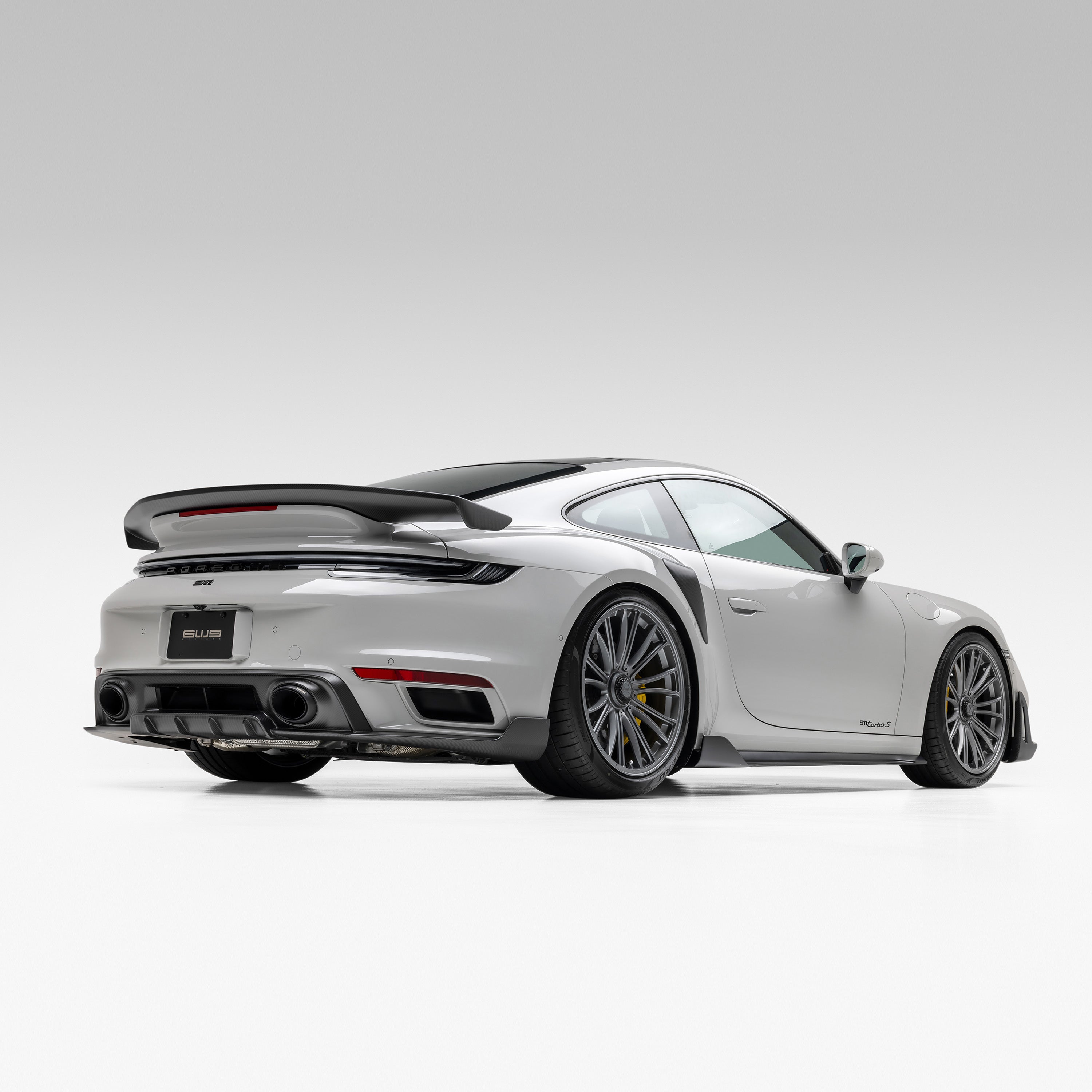 992 Turbo S with Vorsteiner rear wing, rear 3/4 view of car