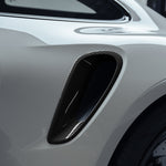 Carbon fender intake trim on 992 Turbo S, angled detail view