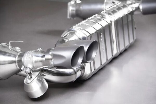 Close side view of Capristo Valved Exhaust with 250 Cell Sports Cats (CES3) for Porsche 997.1 Turbo/S/GT2/2RS 2006-2013 with black background