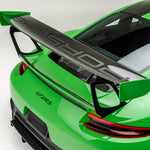 Green GT2 RS rear deck with carbon decklid spoiler, high angled view